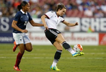 TAMPA, FL - MARCH 3:  Defender Josephine Henning  #2 of Germany controls the ball ahead forward Marie-Laure Delie #18 of France during the second half of the 2016 SheBelieves Cup soccer match on March 3, 2016 at Raymond James Stadium in Tampa, Florida.  (