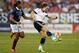 TAMPA, FL - MARCH 3: Defender Josephine Henning #2 of Germany controls the ball ahead forward Marie-Laure Delie #18 of France during the second half of the 2016 SheBelieves Cup soccer match on March 3, 2016 at Raymond James Stadium in Tampa, Florida. (
