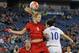 NASHVILLE, TENNESSEE - MARCH 06: Kathrin Hendrich #8 of Germany heads a ball past Karen Carney #10 of England during the second half of a friendly international match in the Shebelieves Cup at Nissan Stadium on March 6, 2016 in Nashville, Tennessee. (Ph