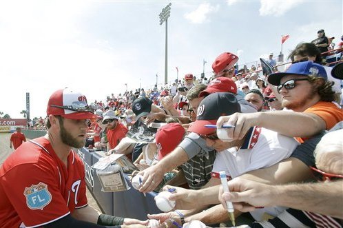 Washington fans unhappy about local baseball star Bryce Harper wearing a  Dallas Cowboys hat