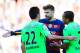 BARCELONA, SPAIN - MARCH 12: Gerard Pique of FC Barcelona argues with Juan Rodriguez (L) and Alvaro Pereira of Getafe CF during the La Liga match between FC Barcelona and Getafe CF at Camp Nou on March 12, 2016 in Barcelona, Spain. (Photo by David Ramos
