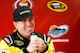 After losing by eight inches, Carl Edwards still cracks a smile.