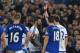 Chelsea's Brazilian-born Spanish striker Diego Costa (C) is shown a red card by referee Michael Oliver during the English FA cup quarter-final football match between Everton and Chelsea at Goodison Park in Liverpool, north west England on March 12, 2016.
