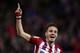 Atletico Madrid's midfielder Saul Niguez celebrates after scoring during the Spanish league football match Club Atletico de Madrid vs RC Deportivo La Coruna at the Vicente Calderon stadium in Madrid on March 12, 2016. / AFP / JAVIER SORIANO (Photo