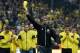 Dortmund's head coach Juergen Klopp and Dortmund's players celebrate after the German first division Bundesliga football match between Borussia Dortmund and SV Werder Bremen at the Signal Iduna Park in Dortmund, western Germany on May 23, 2015. Dortmund w