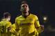 Borussia Dortmund's Gabonese striker Pierre-Emerick Aubameyang celebrates after scoring their second goal during the UEFA Europa League round of 16, second leg football match between Tottenham Hotspur and Borussia Dortmund at White Hart Lane in London on