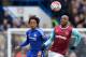 Chelsea's French striker Loic Remy (L) vies with West Ham United's Italian defender Angelo Ogbonna during the English Premier League football match between Chelsea and West Ham United at Stamford Bridge in London on March 19, 2016. / AFP / GLYN KIRK / RES