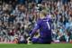 MANCHESTER, ENGLAND - MARCH 20: Joe Hart of Manchester City signals that he is injured during the Barclays Premier League match between Manchester City and Manchester United at the Etihad Stadium on March 20, 2016 in Manchester, England. (Photo by Matth