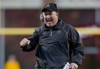 FAYETTEVILLE, AR - OCTOBER 30:   Offensive Line Coach Herb Hand of the Vanderbilt Commodores reacts to a play against the Arkansas Razorbacks at Donald W. Reynolds Stadium on October 30, 2010 in Fayetteville, Arkansas.  The Razorbacks defeated the Commodo