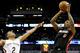 NEW ORLEANS, LA - MARCH 22: Josh Richardson #0 of the Miami Heat shoots over Tim Frazier #2 of the New Orleans Pelicans during the second half at Smoothie King Center on March 22, 2016 in New Orleans, Louisiana. NOTE TO USER: User expressly acknowledges