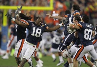 Auburn WR coach Kodi Burns (left) at 2011 BCS National Championship Game