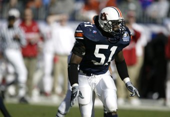 NASHVILLE, TN - DECEMBER 31: Travis Williams #51 of the Auburn Tigers in action against the Wisconsin Badgers during the Music City Bowl at The Coliseum on December 31, 2003 in Nashville, Tennessee. Auburn defeated Wisconsin 28-14. (Photo by Joe Robbins/G