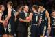 Mar 29, 2016; New York, NY, USA; George Washington Colonials head coach Mike Lonergan (C) talks with guard Alex Mitola (1) during the first half of a semifinal game of the 2016 NIT basketball tournament against the San Diego State Aztecs at Madison Square