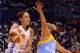 PHOENIX, AZ - SEPTEMBER 07: Guard Diana Taurasi #3 of the Phoenix Mercury makes a pass against guard Elena Delle Donne #11 of the Chicago Sky in the first half during game one of the WNBA Finals at US Airways Center on September 7, 2014 in Phoenix, Arizo
