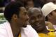 LOS ANGELES, UNITED STATES: Kobe Bryant of the Los Angeles Lakers (L) and teammate Shaquille O'Neal sit on the bench during game 5 of the NBA Western Conference Semifinal Series 16 May 2000 against the Phoenix Suns in Los Angeles. The Lakers went on to w