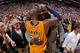 LOS ANGELES, CA - APRIL 13: NBA Legend, Shaquille O'Neal and Kobe Bryant #24 of the Los Angeles Lakers hug after the game against the Utah Jazz on April 13, 2016 at Staples Center in Los Angeles, California. NOTE TO USER: User expressly acknowledges and