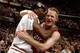 CHICAGO - 1997: Steve Kerr #25 and Michael Jordan #23 of the Chicago Bulls celebrate after defeating the Utah Jazz to win the NBA Championship at the United Center circa 1997 in Chicago, Illinois. NOTE TO USER: User expressly acknowledges and agrees tha