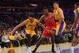 Jan 28, 2016; Los Angeles, CA, USA; Chicago Bulls forward Bobby Portis (5), Los Angeles Lakers forward Larry Nance Jr. (7) and forward Anthony Brown (3) battle for a loose ball in the second half at Staples Center. The Bulls won 114-91. Mandatory Credit: