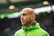 Moenchengladbach's head coach Andre Schubert watch his team warm up prior to during the German first division Bundesliga football match of VfL Wolfsburg v Borussia Moenchengladbach in Wolfsburg, on March 5, 2016. / AFP / ODD ANDERSEN / RESTRICTIONS: DURIN