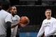 San Antonio Spurs assistant coach Chip Engelland, right, has helped turn Kawhi Leonard into a 44% three-point shooter.
