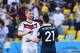 RIO DE JANEIRO, BRAZIL - JULY 04: Per Mertesacker of Germany shakes hands with Laurent Koscielny of France after Germany's 1-0 win during the 2014 FIFA World Cup Brazil Quarter Final match between France and Germany at Maracana on July 4, 2014 in Rio de J