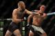McGregor slugs Diaz at UFC 196.