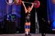 Mattie Rogers sets the USA female clean and jerk record in her weight class as her coach, Daniel Camargo, celebrates.