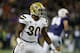 SEATTLE, WA - NOVEMBER 08: Linebacker Myles Jack #30 of the UCLA Bruins defends against the Washington Huskies on November 8, 2014 at Husky Stadium in Seattle, Washington. (Photo by Otto Greule Jr/Getty Images)