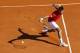 Serbia's Novak Djokovic returns a backhand to Czech Republic's Jiri Vesely during their tennis match at the Monte-Carlo ATP Masters Series tournament, on April 13, 2016 in Monaco. AFP PHOTO / VALERY HACHE / AFP / VALERY HACHE (Photo credit should