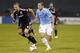 Oct 2, 2015; Washington, DC, USA; New York City FC midfielder Frank Lampard (8) dribbles the ball as D.C. United midfielder/defender Markus Halsti (4) chases in the first half at Robert F. Kennedy Memorial Stadium. United won 2-1. Mandatory Credit: Geoff