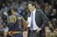Jan 18, 2016; Cleveland, OH, USA; Golden State Warriors interim head coach Luke Walton talks to Cleveland Cavaliers guard Kyrie Irving (2) in the first quarter at Quicken Loans Arena. Mandatory Credit: David Richard-USA TODAY Sports