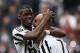 Juventus' forward Simone Zaza (R) celebrates with Juventus' midfielder Paul Pogba from France after scoring during the Italian Serie A football match Juventus Vs Carpi on May 1, 2016 at the 'Juventus Stadium' in Turin. / AFP / MARCO BERTORELLO (P