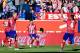 Atletico Madrid's French forward Antoine Griezmann (C) celebrates a goal during the Spanish league football match Club Atletico de Madrid vs CF Rayo Vallecano at the Vicente Calderon stadium in Madrid on April 30, 2016. / AFP / PIERRE-PHILIPPE MARCOU