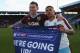 BURNLEY, UNITED KINGDOM - MAY 02: Sam Vokes (9) and Andre Gray of Burnley (7) celebrate as they are promoted to the Premier League after the Sky Bet Championship match between Burnley and Queens Park Rangers at Turf Moor on May 2, 2016 in Burnley, United