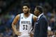 MINNEAPOLIS, MN - MARCH 26: Head coach, Sam Mitchell of the Minnesota Timberwolves speaks with Karl-Anthony Towns #32 during the game against the Utah Jazz on March 26, 2016 at Target Center in Minneapolis, Minnesota. NOTE TO USER: User expressly acknowle