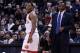 TORONTO, ON - DECEMBER 20: Kyle Lowry #7 and Head Coach Dwane Casey of the Toronto Raptors shout to official Scott Wall #31 after Lowry was ejected from the game in the third quarter during an NBA game against the Sacramento Kings at the Air Canada Centr