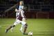 Feb 24, 2016; Tucson, AZ, USA; Colorado Rapids midfielder Micheal Azira (22) controls the ball under pressure from Sporting Kansas City forward Kenny Cooper (31) during the first half at Kino North Stadium. Sporting Kansas City won 4 -1. Mandatory Credit: