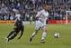 May 1, 2016; Kansas City, KS, USA; Sporting KC mid-fielder Brad Davis (11) dribbles the ball up the field past LA Galaxy forward Emmanuel Boateng (24) during the first half at Children's Mercy Park. Mandatory Credit: Peter G. Aiken-USA TODAY Sports