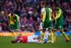 LONDON, ENGLAND - APRIL 30: Olivier Giroud of Arsenal lies on the pitch after colliding with Sebastien Bassong of Norwich City during the Barclays Premier League match between Arsenal and Norwich City at The Emirates Stadium on April 30, 2016 in London, E