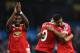 Fosu-Mensah celebrates with Martial and Rashford.