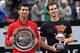 Britain's Andy Murray poses next to Novak Djokovic of Serbia after after winning the men's final match at the ATP Tennis Open on May 15, 2016 at the Foro Italico in Rome. / AFP / TIZIANA FABI (Photo credit should read TIZIANA FABI/AFP/Getty Images)