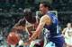 CHICAGO, UNITED STATES: Chicago Bull player Michael Jordan (L) tries to get around Jeff Hornacek of Utah Jazz 01 June 1997 during the first half of game one of the NBA Finals at the United Center in Chicago, Il. AFP PHOTO/JEFF HAYNES (Photo credit should