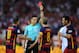 MADRID, SPAIN - MAY 22: Barcelona players protest while Referee Carlos del Cerro Grande hands Javier Mascherano of FC Barcelona the red card for during the Copa del Rey Final between Barcelona and Sevilla at Vicente Calderon Stadium on May 22, 2016 in