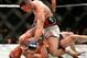 Nate Diaz (top) fights Conor McGregor.