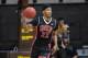 Jan 9, 2016; Laramie, WY, USA; UNLV Runnin' Rebels guard Patrick McCaw (22) brings the ball up court against the Wyoming Cowboys during the first half at Arena-Auditorium. The Cowboys beat the Runnin' Rebels 59-57. Mandatory Credit: Troy Babbitt-USA TODAY