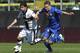 PARMA, ITALY - APRIL 14: Jaime Valdes (L) of Parma FC competes for the ball with Antonio Piotr Zielinski of Udinese Calcio during the Serie A match between Parma FC and Udinese Calcio at Stadio Ennio Tardini on April 14, 2013 in Parma, Italy. (Photo by