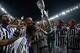 SHANGHAI, CHINA - AUGUST 08: Martin Caceres (C) of Juventus celebrates with with teammates after winning the Italian Super Cup final football match between Juventus and Lazio at Shanghai Stadium on August 8, 2015 in Shanghai, China. (Photo by Lintao Zha
