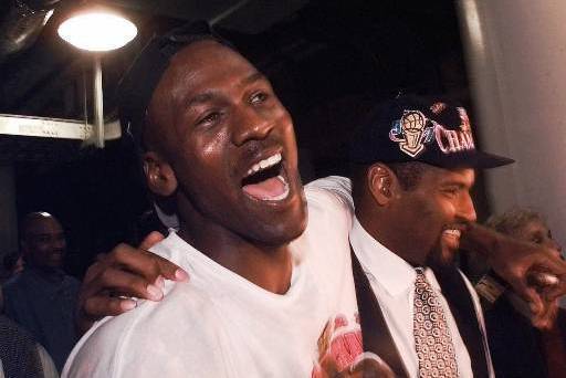 Jordan celebrates the Bulls' 1996-97 NBA Finals victory.