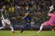 Chile's Palestino goalkeeper Dario Melo (R) stops a kick from Argentina's Boca Juniors forward Guido Vadala (C) during the Copa Libertadores 2015 group 5 football match, at La Bombonera stadium in Buenos Aires, Argentina, on April 16, 2015. AFP PHOTO / AL
