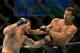 Rockhold defending early.